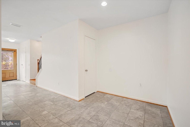 13637 Winterspoon Ln Unit 18, Germantown, MD 20874 - unfurnished room with baseboards, stairs, and recessed lighting