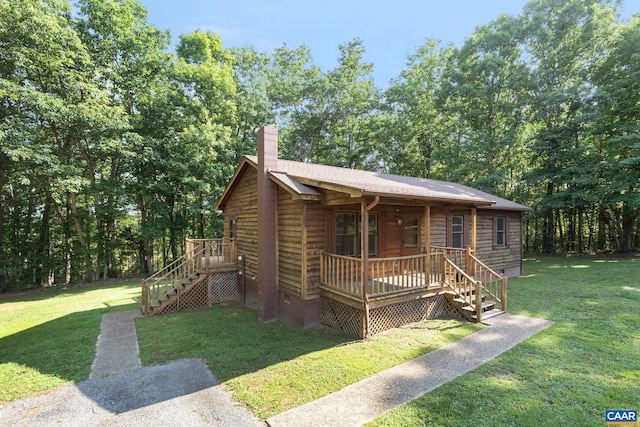 406 Green Meadow Ln, Scottsville, VA 24590 - view of front facade featuring a chimney, a front lawn, covered porch, and stairway