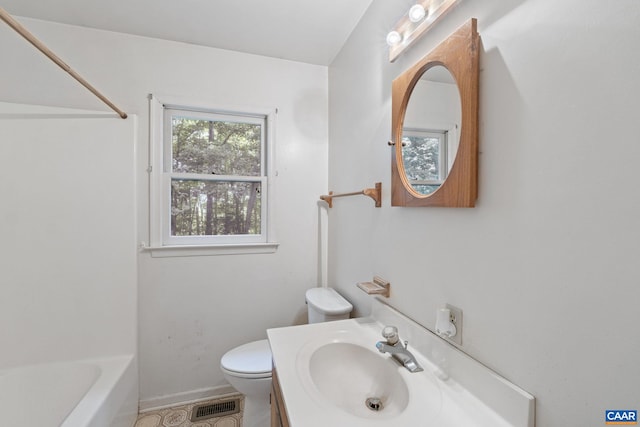 406 Green Meadow Ln, Scottsville, VA 24590 - bathroom featuring toilet, baseboards, and vanity