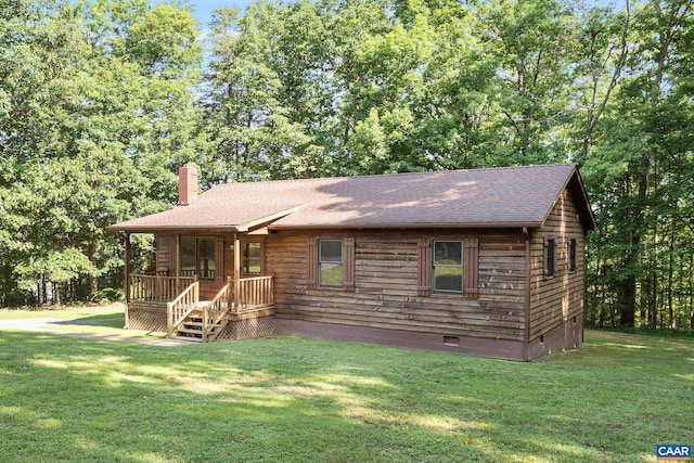 406 Green Meadow Ln, Scottsville, VA 24590 - chalet / cabin with crawl space, a chimney, a front lawn, and a shingled roof