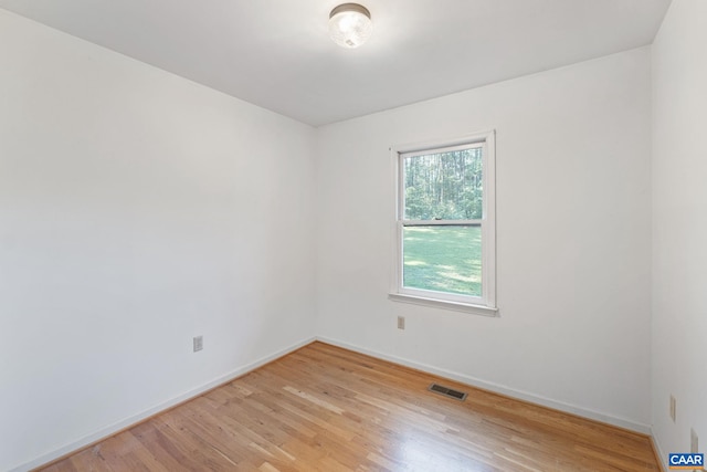 406 Green Meadow Ln, Scottsville, VA 24590 - spare room with light wood-style floors and baseboards