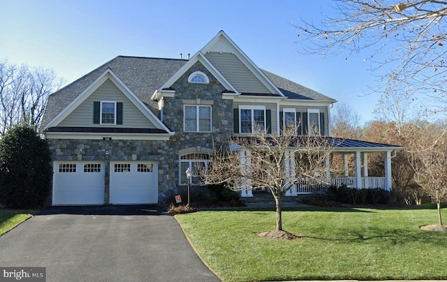 505 Sherwood Mills Ct, Sandy Spring, MD 20860 - craftsman house with stone siding, a front lawn, and covered porch