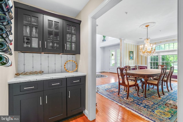 505 Sherwood Mills Ct, Sandy Spring, MD 20860 - dining space with light wood finished floors and a chandelier