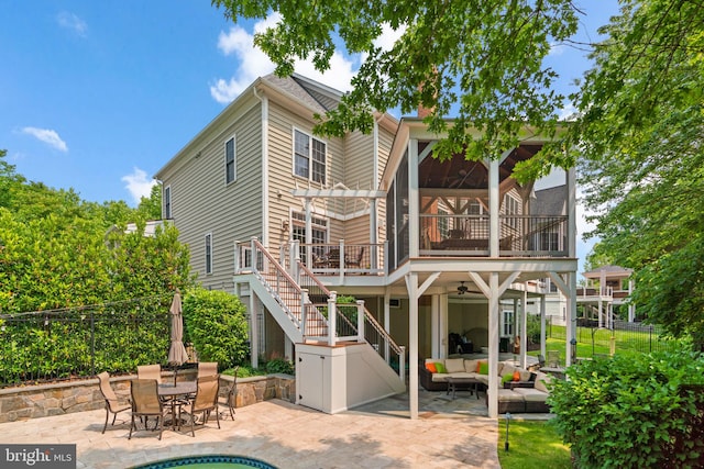 505 Sherwood Mills Ct, Sandy Spring, MD 20860 - back of property featuring an outdoor hangout area, a patio area, a ceiling fan, and stairway