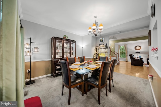 5341 Yellow Turtle Pl, Woodbridge, VA 22193 - carpeted dining area featuring a chandelier, crown molding, and stairway