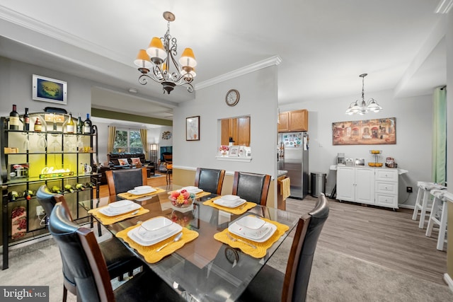5341 Yellow Turtle Pl, Woodbridge, VA 22193 - dining room with a chandelier, ornamental molding, and light wood finished floors
