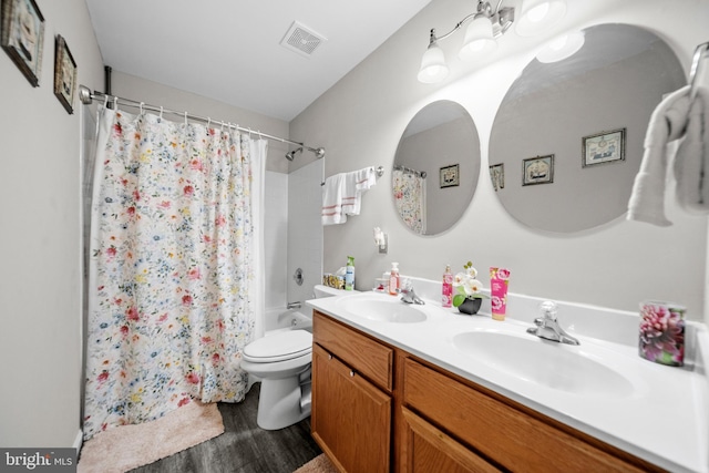 5341 Yellow Turtle Pl, Woodbridge, VA 22193 - full bath featuring double vanity, wood finished floors, and shower / tub combo