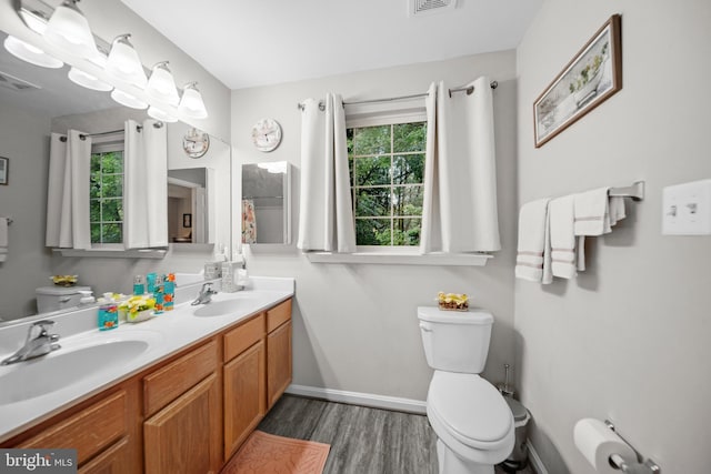 5341 Yellow Turtle Pl, Woodbridge, VA 22193 - bathroom with wood finished floors, double vanity, and a shower with curtain