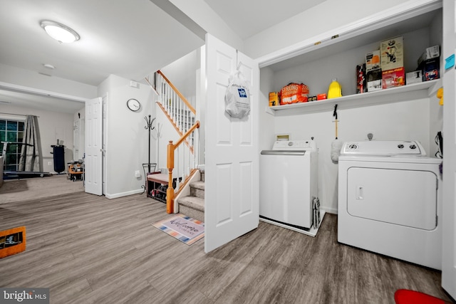 5341 Yellow Turtle Pl, Woodbridge, VA 22193 - laundry area with washer and clothes dryer and wood finished floors