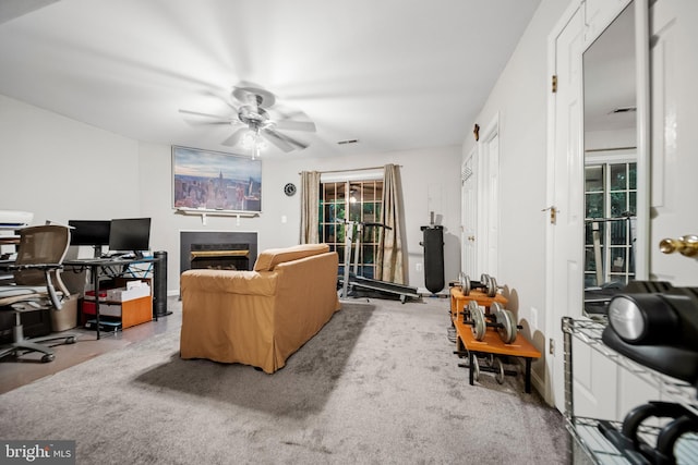 5341 Yellow Turtle Pl, Woodbridge, VA 22193 - living area featuring an office area, ceiling fan, and a glass covered fireplace