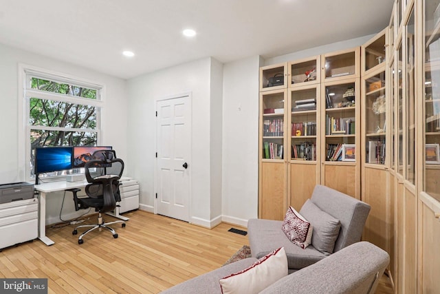 2254 12th St NW, Washington, DC 20009 - home office featuring wood-type flooring, recessed lighting, and baseboards