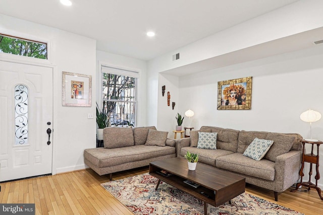 2254 12th St NW, Washington, DC 20009 - living room with light wood finished floors, recessed lighting, and baseboards