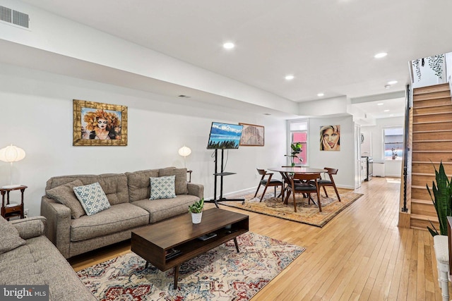 2254 12th St NW, Washington, DC 20009 - living area featuring light wood-style floors, recessed lighting, baseboards, and stairs