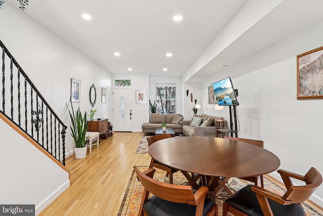 2254 12th St NW, Washington, DC 20009 - dining area with recessed lighting, baseboards, light wood-type flooring, and stairway