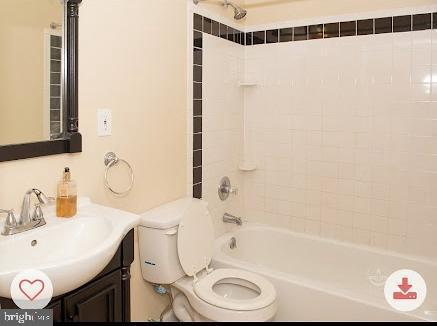 321 Elm St NW, Washington, DC 20001 - full bath featuring toilet,  shower combination, and vanity