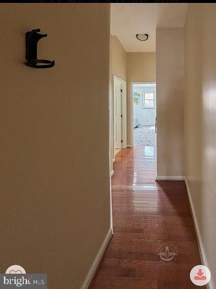 321 Elm St NW, Washington, DC 20001 - corridor featuring wood finished floors and baseboards