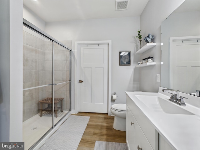 11020 Augusta Ln Unit 3, Berlin, MD 21811 - full bath featuring toilet, a shower stall, vanity, and wood finished floors