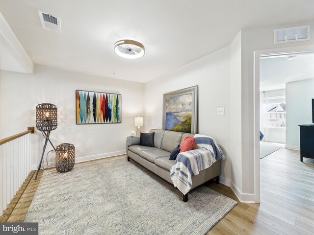 11020 Augusta Ln Unit 3, Berlin, MD 21811 - living room featuring light wood-style flooring and baseboards