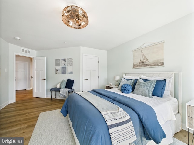 11020 Augusta Ln Unit 3, Berlin, MD 21811 - bedroom featuring wood finished floors and baseboards