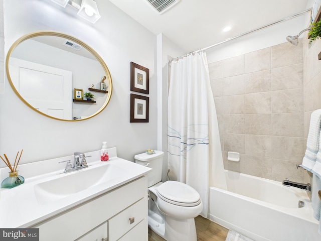 11020 Augusta Ln Unit 3, Berlin, MD 21811 - bathroom featuring toilet, vanity, shower / bath combo, and wood finished floors
