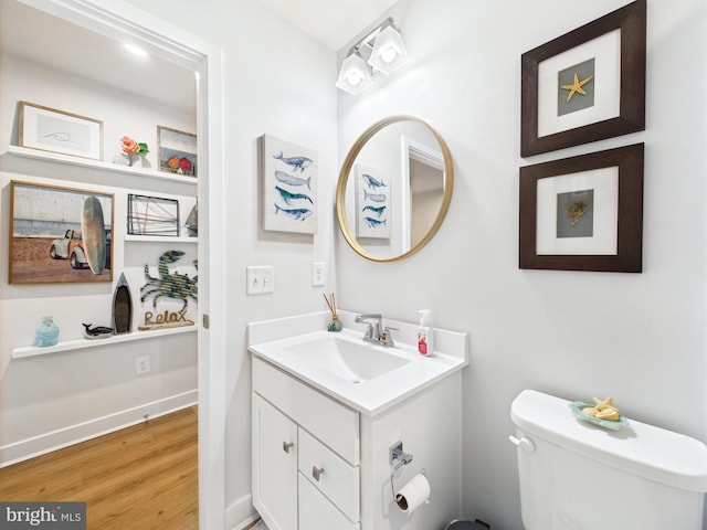 11020 Augusta Ln Unit 3, Berlin, MD 21811 - half bath featuring vanity, wood finished floors, and toilet