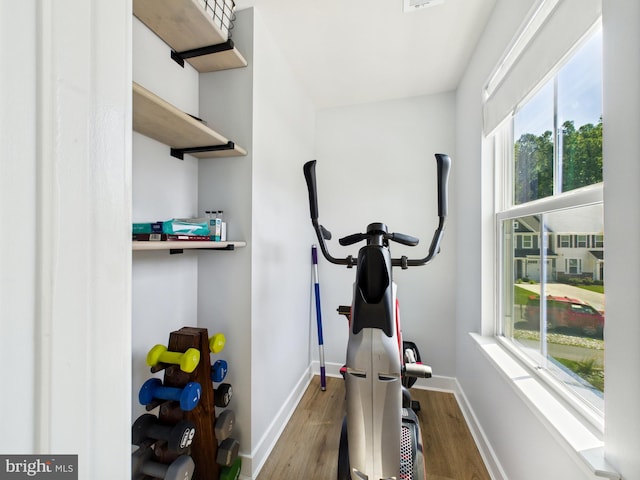 11020 Augusta Ln Unit 3, Berlin, MD 21811 - workout area with wood finished floors, plenty of natural light, and baseboards