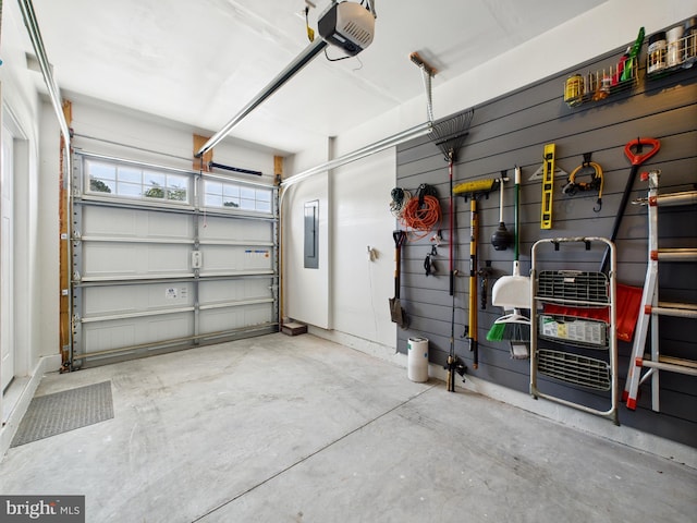 11020 Augusta Ln Unit 3, Berlin, MD 21811 - garage featuring a garage door opener and electric panel