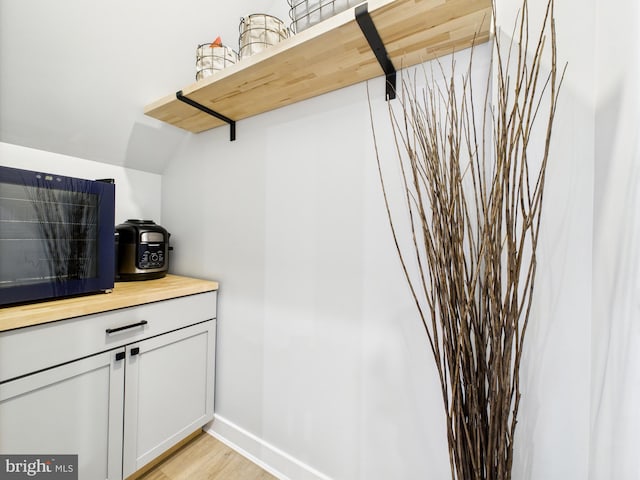 11020 Augusta Ln Unit 3, Berlin, MD 21811 - detailed view of wood finished floors and baseboards