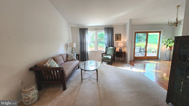 15204 Watergate Rd, Silver Spring, MD 20905 - living room with a chandelier and wood finished floors