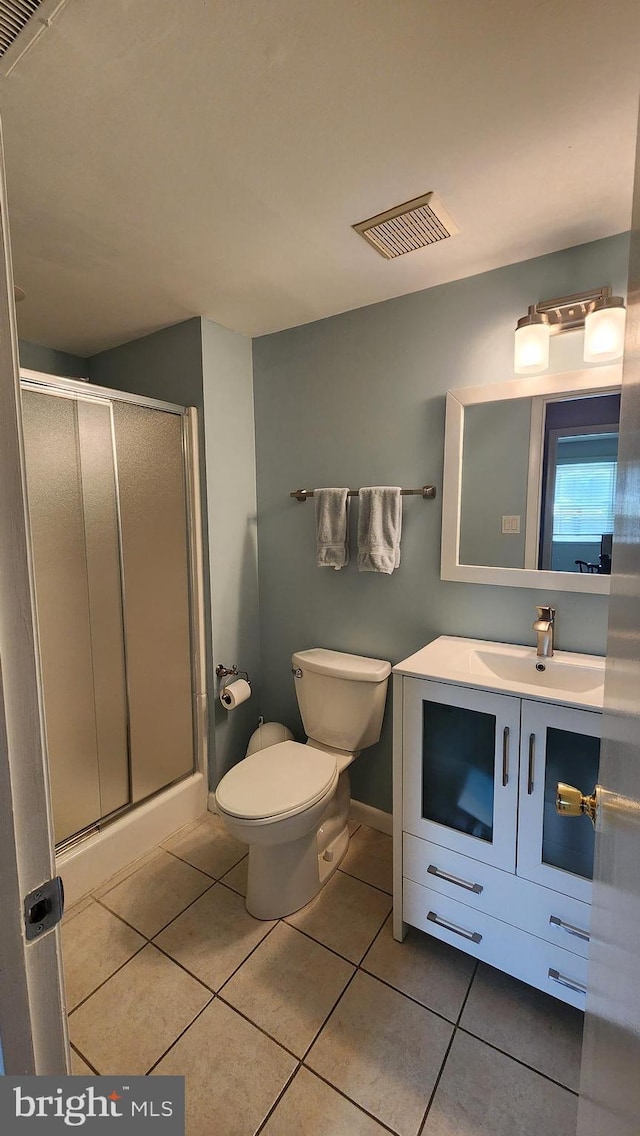 15204 Watergate Rd, Silver Spring, MD 20905 - full bathroom featuring tile patterned flooring, toilet, a shower stall, and vanity