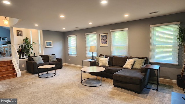 15204 Watergate Rd, Silver Spring, MD 20905 - carpeted living area featuring recessed lighting, plenty of natural light, and baseboards