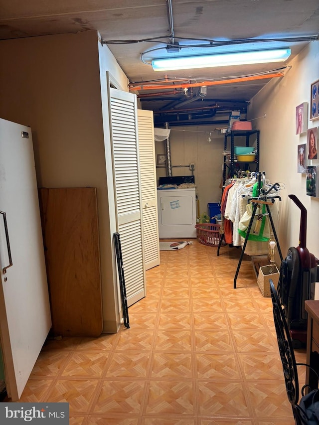 3108 Centennial Unit 310, Warminster, PA 18974 - basement with freestanding refrigerator and washer and dryer