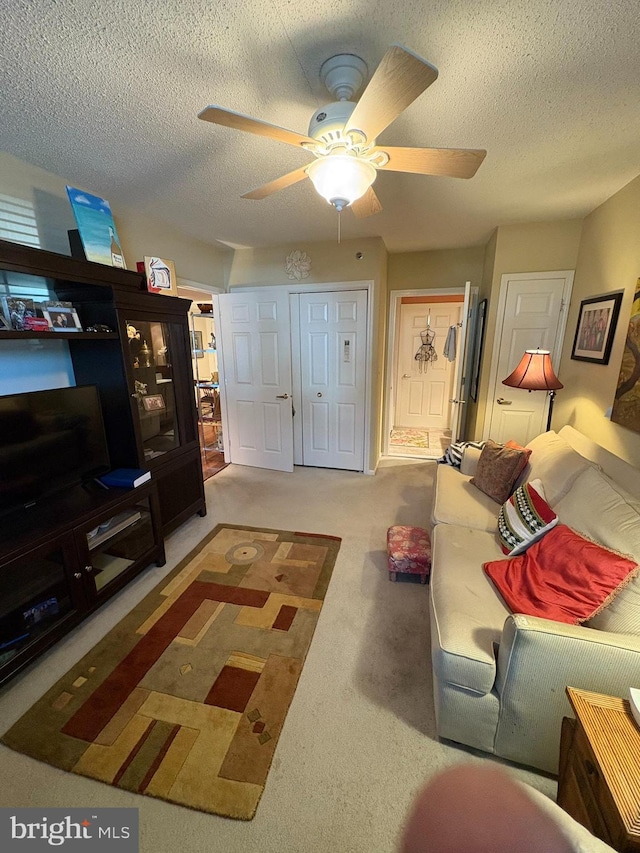 3108 Centennial Unit 310, Warminster, PA 18974 - carpeted living room with a textured ceiling and ceiling fan