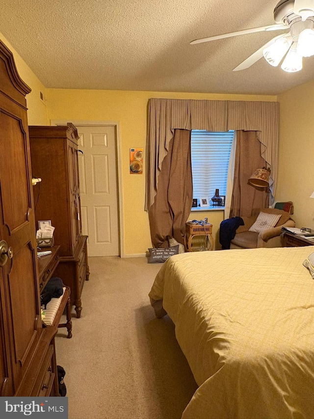 3108 Centennial Unit 310, Warminster, PA 18974 - bedroom featuring light carpet, a textured ceiling, and ceiling fan