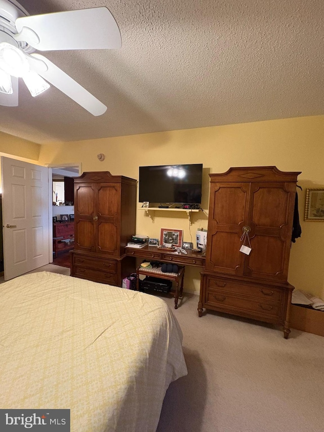 3108 Centennial Unit 310, Warminster, PA 18974 - bedroom featuring light carpet, a textured ceiling, and a ceiling fan