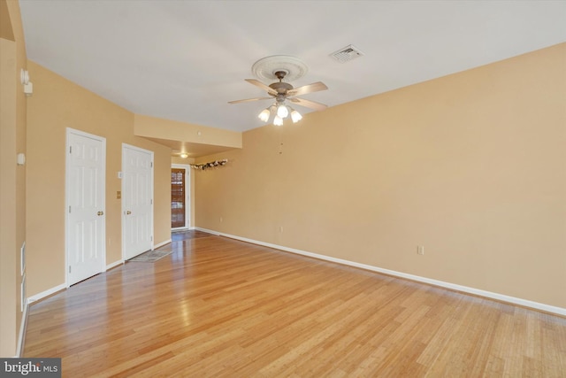 2325 Slater Hill Ln E Unit 39, York, PA 17406 - empty room with light wood finished floors, baseboards, and ceiling fan