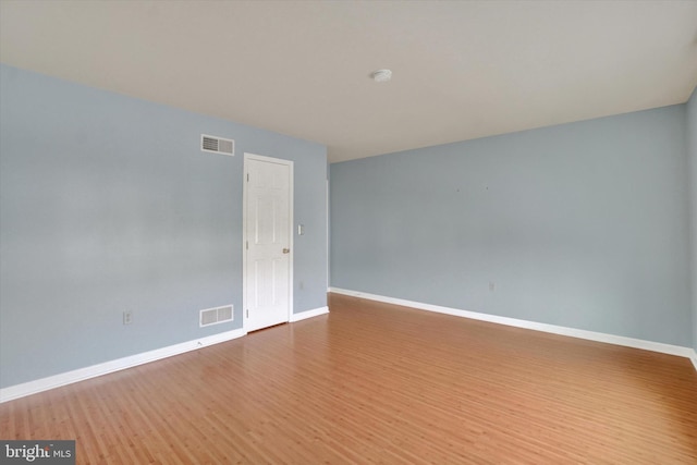 2325 Slater Hill Ln E Unit 39, York, PA 17406 - spare room with wood finished floors, baseboards, and a smoke detector