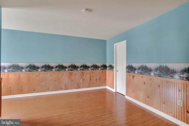 2325 Slater Hill Ln E Unit 39, York, PA 17406 - spare room with wainscoting, wood finished floors, a smoke detector, and wood walls