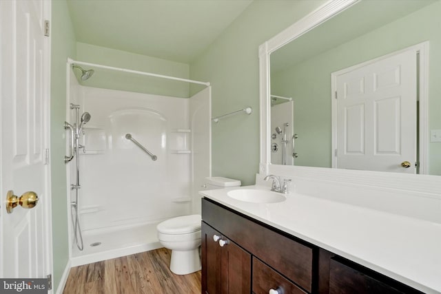 2325 Slater Hill Ln E Unit 39, York, PA 17406 - full bathroom featuring vanity, wood finished floors, toilet, and a shower