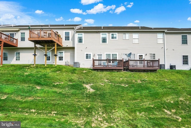 2325 Slater Hill Ln E Unit 39, York, PA 17406 - back of property with central air condition unit, a deck, and a lawn
