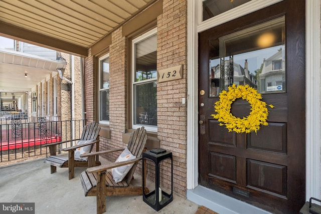 152 W Sharpnack St, Philadelphia, PA 19119 - entrance to property featuring a porch and brick siding