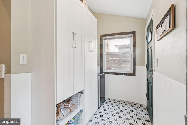 152 W Sharpnack St, Philadelphia, PA 19119 - mudroom featuring wainscoting, vaulted ceiling, and tile walls
