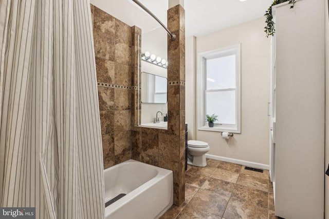 152 W Sharpnack St, Philadelphia, PA 19119 - bathroom with toilet, shower / tub combo, baseboards, a sink, and stone finish flooring