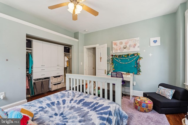 152 W Sharpnack St, Philadelphia, PA 19119 - bedroom with a closet, baseboards, dark wood finished floors, and ceiling fan
