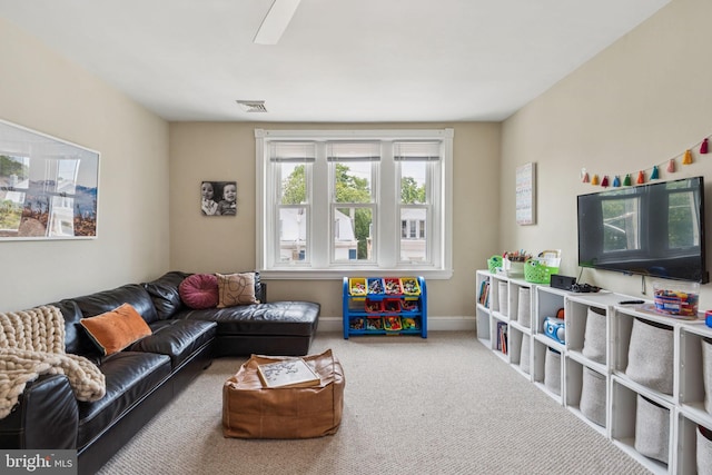 152 W Sharpnack St, Philadelphia, PA 19119 - carpeted living area with baseboards