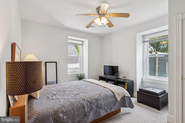 152 W Sharpnack St, Philadelphia, PA 19119 - bedroom with multiple windows, carpet floors, a ceiling fan, and baseboards