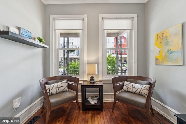 152 W Sharpnack St, Philadelphia, PA 19119 - living area featuring dark wood-style floors, ornamental molding, and baseboards