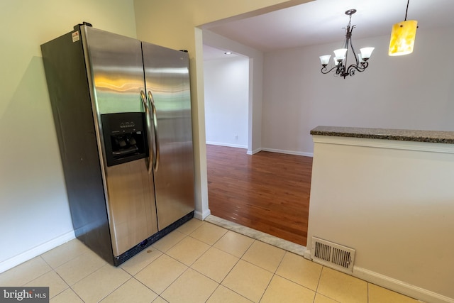 1545 Shoemaker Rd, Abington, PA 19001 - kitchen featuring stainless steel fridge with ice dispenser, a chandelier, decorative light fixtures, light wood-type flooring, and dark countertops