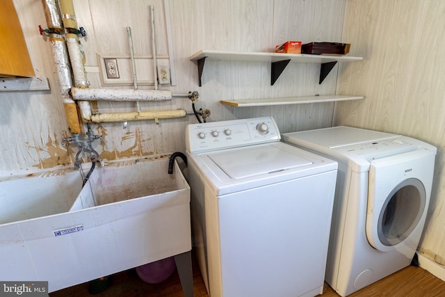 1545 Shoemaker Rd, Abington, PA 19001 - laundry room with washer and clothes dryer and wood finished floors