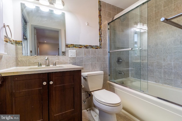 1545 Shoemaker Rd, Abington, PA 19001 - bathroom with vanity, tile walls, and enclosed tub / shower combo
